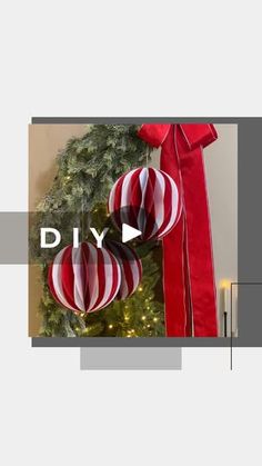 a christmas tree with red and white ornaments hanging from it's branches, next to a wreath