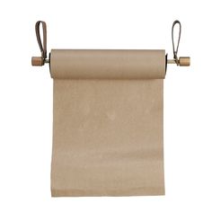 a roll of brown paper hanging from a metal hook on a white background with clippings