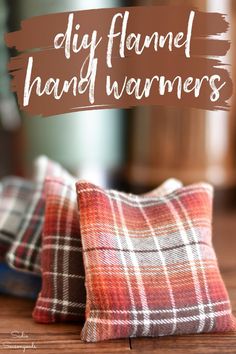 two plaid pillows with the words diy flanned hand warmers