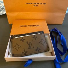 Louis Vuitton Reverse Card Holder. Sold Out And Hard To Find. Comes With Everything At Purchase Receipt, Box, Tags, Dust Bag, Bag. No Trades Firm Price Lv Card Holder, Louis Vuitton Card Holder, Reverse Card, Purchase Receipt, Credit Card Holder, Louis Vuitton Bags, Bag Bag, Hard To Find, Tan Brown