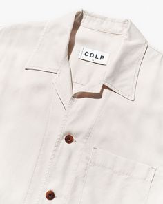 Our garment dyed, twill-weave Pool Shirt is designed with a relaxed and boxy fit, straight hem, and camp collar. Made of Tencel™ lyocell—fibres derived from certified renewable wood sources—providing breathability and a rich drape.    Relaxed, boxy fit   Camp collar   Straight hem   Four-button front closure   Chest patch pocket   Fits true to size   Style ID: MSW013112101-1500    100% Tencel™ lyocell  Made in Portugal Pool Shirts, Off White Shop, Twill Weave, Dress Socks, White Shop, Summer Dresses For Women, Swim Shorts, Mens Summer, Womens Swimwear