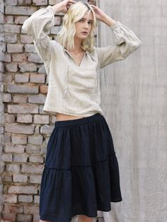 "Linen skirt with delicate, decorative wild edge on the frills. Relaxed fit with mid waist. Gorgeous, elegant and natural. The simple cut, perfect for any figure. Pair with our linen tops. French seems DETAILS: - 100% washed, softened, light linen. - Includes one linen skirt - The images above show the 'navy blue' colour - Wide waistband ensures comfort - Pockets on the sides - Shrinkage after the first wash up to 3% - Does not cause allergies - Has bacteriostatic properties - Is ecological and Peasant Style Ruffled Tiered Skirt Bottoms, Peasant Style Tiered Skirt Bottoms With Ruffles, Peasant Style Tiered Skirt With Ruffles, Peasant Style Tiered Lined Skirt, Peasant Style Flowy Skirt With Ruffles, Beige Ruffled Midi Skirt, Beige Ruffled Bottoms For Fall, Beige Tiered Ruffle Skirt, Beige Tiered Skirt With Ruffle Hem