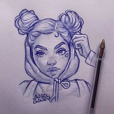 a pencil drawing of a woman's face with hair in buns on her head