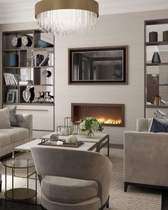 a living room filled with furniture and a fire place in the middle of the room