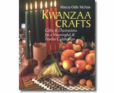 a book with candles and fruit on it