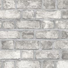 a gray brick wall with no mortars