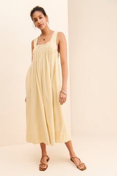 Rent Delphine Midi Dress from Nuuly. Pick 6 items for $98/month. Free shipping + returns. Unlined Maxi Length Dress For Brunch, Yellow Midi-length Dress With Smocked Back, Yellow Midi Dress With Smocked Back, Spring Beige Empire Waist Dress, Beige Empire Waist Dress For Spring, Daytime Sleeveless Dress With Smocked Back, Sleeveless Smocked Back Dress For Daytime, Summer Dresses With Square Neck For Daywear, Daytime Midi Dress With Smocked Back