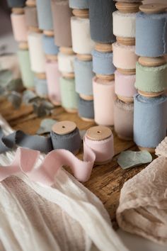 many spools of thread are on the table