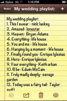 the wedding playlist is written on a notepad