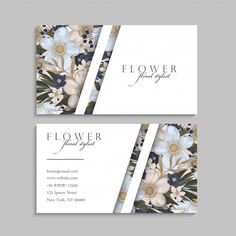 two business cards with flowers on the front and back, both in white and blue