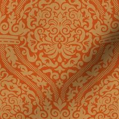 an orange and white pattern on fabric