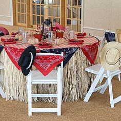 the table is decorated with red, white and blue decorations