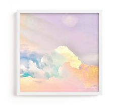 the sky is filled with clouds in pastel colors