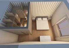 an overhead view of a bedroom with a bed, desk and storage space in it