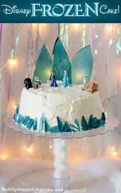 a frozen cake with frosting and decorations on top