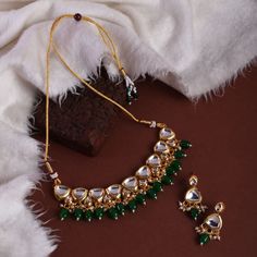 "Hey, Welcome to our shop! Sabyasachi Inspired Indian Wedding Bollywood Heavy Bridal Style Fine Green Pearl Victorian Pachi Kundan Polki Choker With Dangler Earring Punjabi Choker Pakistani jewelry Indian necklace Punjabi Choker Kundan Set/ Engagement Jewelry / Statement Jewelry Set/ Stud Earring For Women And Girl/ Best For Anniversary / Birthday / Valentine's Day.  < 1 DAY ITEM SHIPMENT | 7-8 Days Delivery TIME> About our Jewellery - Classic, Brilliant & Elegant. We deal in all type of Premium Indian Bollywood Jewellery. * AD Jewelry set * Kundan Necklace * Polki Jewellery * Uncut Jewellery * AD Ring * AD Bangles * AD Pendant Set * Pachi Kundan & many more.. * All our products are made with high-quality stones, the intricate texture and design makes it a must-have for every modern woman. Bollywood Style Festive Necklace With Gota Work, Bollywood Style Temple Necklace With Gota Work As Gift, Bollywood Style Temple Necklace With Gota Work, Traditional Festive Jewelry Sets With Gota Work, Bollywood Festive Jewelry With Gota Work, Festive Bollywood Jewelry With Gota Work, Bollywood Style Festive Jewelry With Gota Work, Festive Lehenga With Pallu As A Gift, Bollywood Style Lehenga With Pallu As A Gift