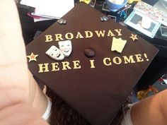 a graduation cap that says broadway here i come