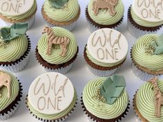 cupcakes decorated with green frosting and decorations