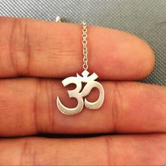 Beautiful Om Symbol Necklace In 100% Sterling Silver. It’s Sexy, Playful, Fun, Sturdy And A Perfect Gift For A Yogi Or Yogini You Love! Just Lowered The Price 40% - This Necklace Is Sure To Bring You Lots Of Compliments Wherever You Go. Silver Spiritual Lariat Necklace As Gift, Spiritual Sterling Silver Lariat Necklace Gift, Spiritual Silver Lariat Necklace As A Gift, Symbolic Silver Necklace With Delicate Chain, Symbolic Sterling Silver Necklace With Delicate Chain, Om Symbol, Symbol Necklace, Jewelry Sterling Silver, Style Necklace