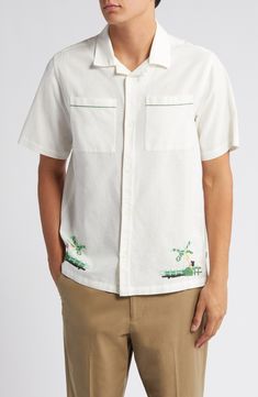 Palm-themed cross-stitching lends an artisanal touch to a festival-ready camp shirt cut from a breathable blend of cotton and linen. 28" length; 43" chest (size Medium) Front button closure Convertible collar Short sleeves Chest patch pockets 84% cotton, 16% linen Machine wash, line dry Imported Convertible Collar, Skirt Swimsuit, Camp Shirt, Suit Separates, Chest Size, Short Suit, Cross Stitching, Pant Shirt, Camping Shirt