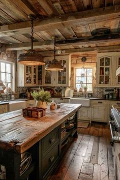 an old fashioned kitchen with wooden floors and white cabinets is pictured in this image from the front