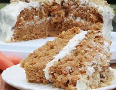 a piece of carrot cake on a white plate