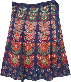 This mid length gypsy wrap-around skirt makes you feel relaxed in its flowing cotton fabric and a wrap around waist.  One of its kind with the color combination and design patterns of an old civilization. #tlb #WrapAroundSkirt #XLPlus #Floral #Printed #bohemianfashion #Indian #plussizewraparoundskirt #plussizehippiewrapskirt Bohemian Long Wrap Skirt With Batik Print, Traditional Multicolor Long Wrap Skirt, Bohemian Festival Skirt With Batik Print, Bohemian Batik Print Skirt For Festival, Bohemian Batik Print Festival Skirt, Bohemian Beach Skirt With Vibrant Print, Bohemian Cotton Skirt With Batik Print, Multicolor Wrap Skirt For Festivals, Summer Bohemian Skirt With Traditional Patterns