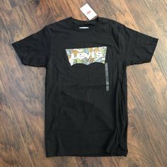 Nwt! Size: S Camo Logo Front Bundle And Save A Bundle. No Trades. Offers Welcome :) Levi's Cotton Shirt With Graphic Print, Levi's Black Graphic Print Top, Levi's Black Short Sleeve T-shirt, Levi's Black Casual T-shirt, Levi's Black Short Sleeve Tops, Levi's Black Summer Tops, Levis Shirt, Logo T Shirt, Black Green