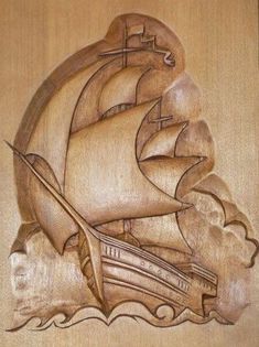 a wooden plaque with a ship on it