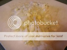 a pile of onions sitting on top of a cutting board with the words protect more of your memories for less