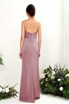 the back of a bridesmaid's dress with spaghetti straps