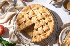 an apple pie with one slice cut out