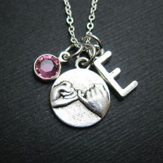 "BFF Pinky Promise necklace with personalized initial charm and your choice of birthstone crystal. Create a meaningful gift or wear as your own personalized necklace. This promise necklace comes gift wrapped in gift bag or gift box. ♥ Pinky promise charm measures approx. 15 x 18 mm ♥ 4mm Swarovski crystal birthstone ♥ 18\" Silver-plated cable necklace . . . . . . . . . . . . . . . . . . . . . . . . HOW TO ORDER . . . . . . . . . . . . . . . . . . . . . . . . . 1) Select a Swarovski crystal birthstone 2) Select a letter and initial design ♥ Let me know if you need a different necklace length or chain design ♥ Leave a message in the 'Note to LaVieIllustree' box: eg. 16\", 17\", 18\", 24\" . . . . . . . . . . . . . . . . . . . . . . . . . . . . . . . . . . . . . . . . . . . . . . . . . . . . Pinkie Promise Necklace, Adjustable Charm Necklaces For Mother's Day And Friendship, Meaningful Sterling Silver Necklace For Friendship, Mother's Day Friendship Charm Necklace, Meaningful Sterling Silver Friendship Necklace, Personalized Birthstone Round Pendant For Valentine's Day, Personalized Round Birthstone Necklace For Valentine's Day, Meaningful Hand Stamped Jewelry For Friendship, Meaningful Nickel-free Jewelry For Best Friend