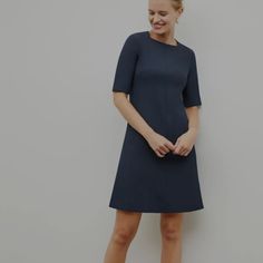 The Emily Is Unmistakably Elegant But Can Hold Its Own In A Room Full Of Suits. In Addition To Its Signature Square Neckline, It Has So Many Of The Details You Love: Elbow-Length Sleeves, Useful Pockets, An A-Line Skirt, And Fabric That You Can Machine Wash. Blue Knee-length Shirt Dress With Placket, Mm Lafleur, Size 6 Dress, Square Necklines, Elbow Length Sleeve, A Line Skirt, Square Neckline, A Line Skirts, Colorful Dresses