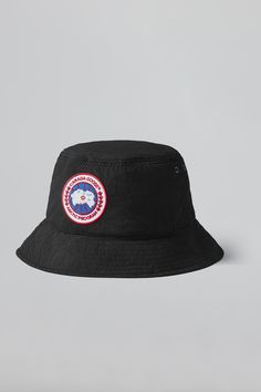 Designed  for  all-day  wear and sun protection, the Haven Bucket hat has you covered from all angles. Crafted from our Dura-Force Light for breathability and comfort. It features an adjustable cord lock for adaptability, reflective tape for low light visibility, and our signature Arctic Disc logo. Canada Goose Hat, Canada Goose Logo, Bucket Hat White, Bucket Hat Design, Les Angles, Mens Bucket Hats, Bucket Hat Black, Reflective Tape, Low Light