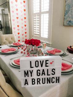 a table set with plates, cups and napkins that say love my gals a brunch