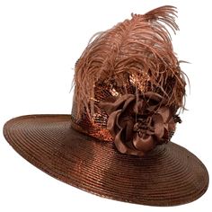 Custom Made Suzanne Couture Millinery Copper Straw Medium Brim Hat w Tall Crown Feathers & Silk Flowers: Gleaming copper straw hat with slightly convex crown and wide layered hatband in contrasting ribbons. Ostrich feather accent with fabric floral bouquet. Brim measures 19" across. US size 6 7/8. Please visit our 1Dibs Store for many more options from this same collection! Tall Crown, Millinery Hats, Ostrich Feather, Ostrich Feathers, Fabric Floral, Hat Band, Brim Hat, Hat Making, Floral Bouquets