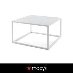 a white coffee table with the words macy's on it and an image of a star