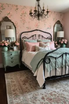 a bed room with a neatly made bed and a chandelier