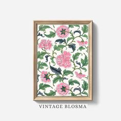 a pink and green floral print on a white background with the words vintage blooma