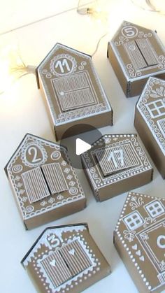 some brown boxes with white designs on them