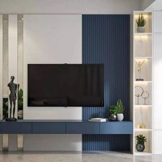 a modern living room with blue and white striped walls, an entertainment center and a large flat screen tv mounted on the wall