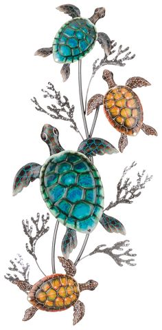 two sea turtle sculptures with corals and seaweed in the center on a white background