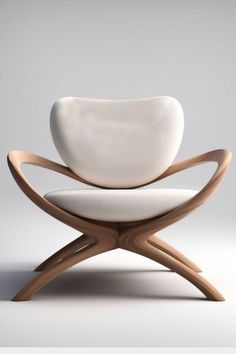 a white chair sitting on top of a wooden frame