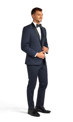 A slim navy tuxedo with one button and a shawl lapel. Elegant Navy Blazer For Wedding, Dapper Tuxedo With Notch Lapel In Suiting Fabric, Fitted Navy Tuxedo Three-piece Suit, Navy Tuxedo With Suit Collar In Suiting Fabric, Navy Tuxedo For Formal Occasions, Navy Tuxedo Style Three-piece Suit For Formal Occasions, Navy Fitted Tuxedo Style Three-piece Suit, Navy Tailored Tuxedo For Wedding, Navy Fitted Tuxedo For Wedding