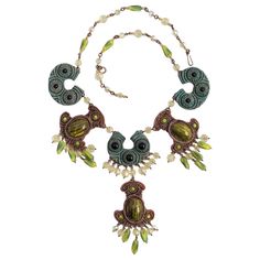 Henry - Bib necklace composed of green and brown talosel (layered resin) paved with tiger-eye-style cabochons in chartreuse green. Additional information: Dimensions: Length: 64 cm (25.19 in), Pendant length: 14 cm (5.51 in) Condition: Very good condition Seller Ref number: BC1123 Henry Green, Chartreuse Green, Bib Necklace, Tiger Eye, Green And Brown, Chains Necklace, Statement Necklace, Charm Bracelet, Jewelry Necklaces