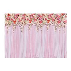 a pink backdrop with flowers and fringes