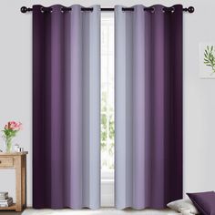 the curtains in this room are purple and white