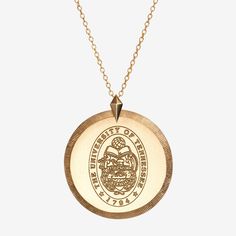 Inspired by vintage coin necklaces, the Florentine Crest Necklace is our largest pendant in the series, and can be worn layered or alone as a chic statement. The 'Florentine finished' frame is created using an Italian technique that creates tiny cross-hatch engraved lines. Diameter: 25mm or approximately the size of a quarter Thickness: 1.2mm Bail Size: 3mm x 6.6mm Sits on 22'' chain, adjustable to 20'' Available in Sterling Silver, Cavan Gold, and 14K Gold Gold Fronts, Tiny Cross, Johns Hopkins, Coin Necklace, Chain Styles, Jewelry Care, Personalized Jewelry, Tennessee, Coin