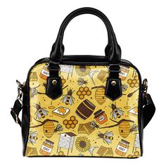 a yellow and black handbag with bees, honeybees and sunflowers on it